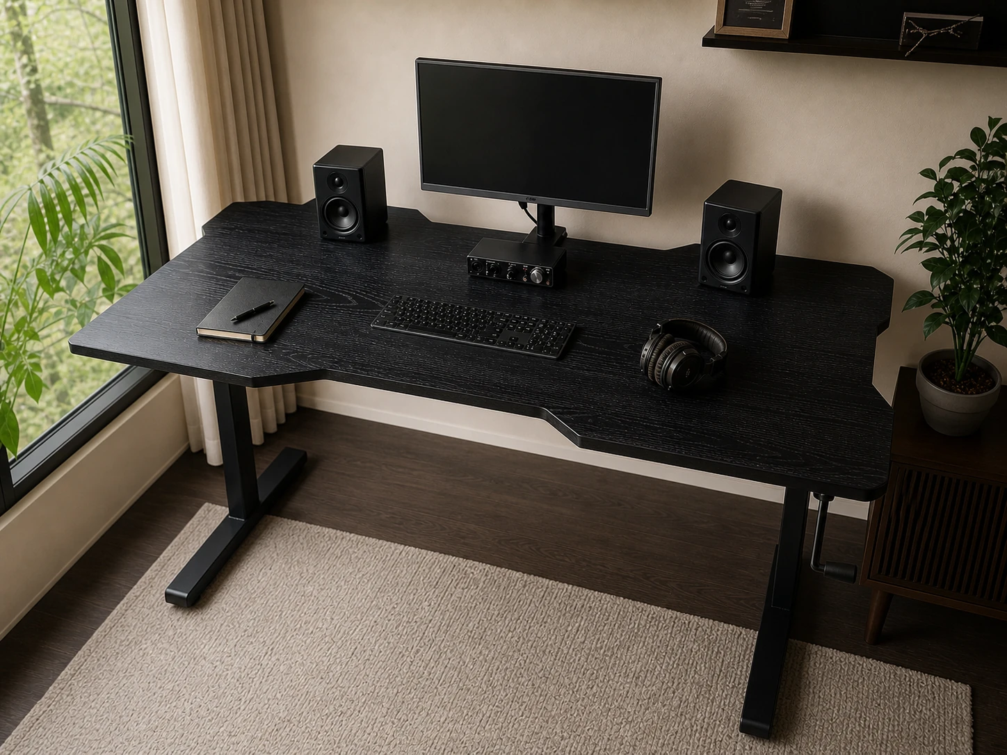 Black custom-shaped studio tabletop on a visible hand-crank adjustable frame